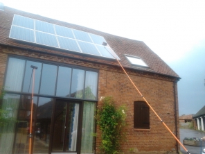 solar panels cleaned with high reach poles